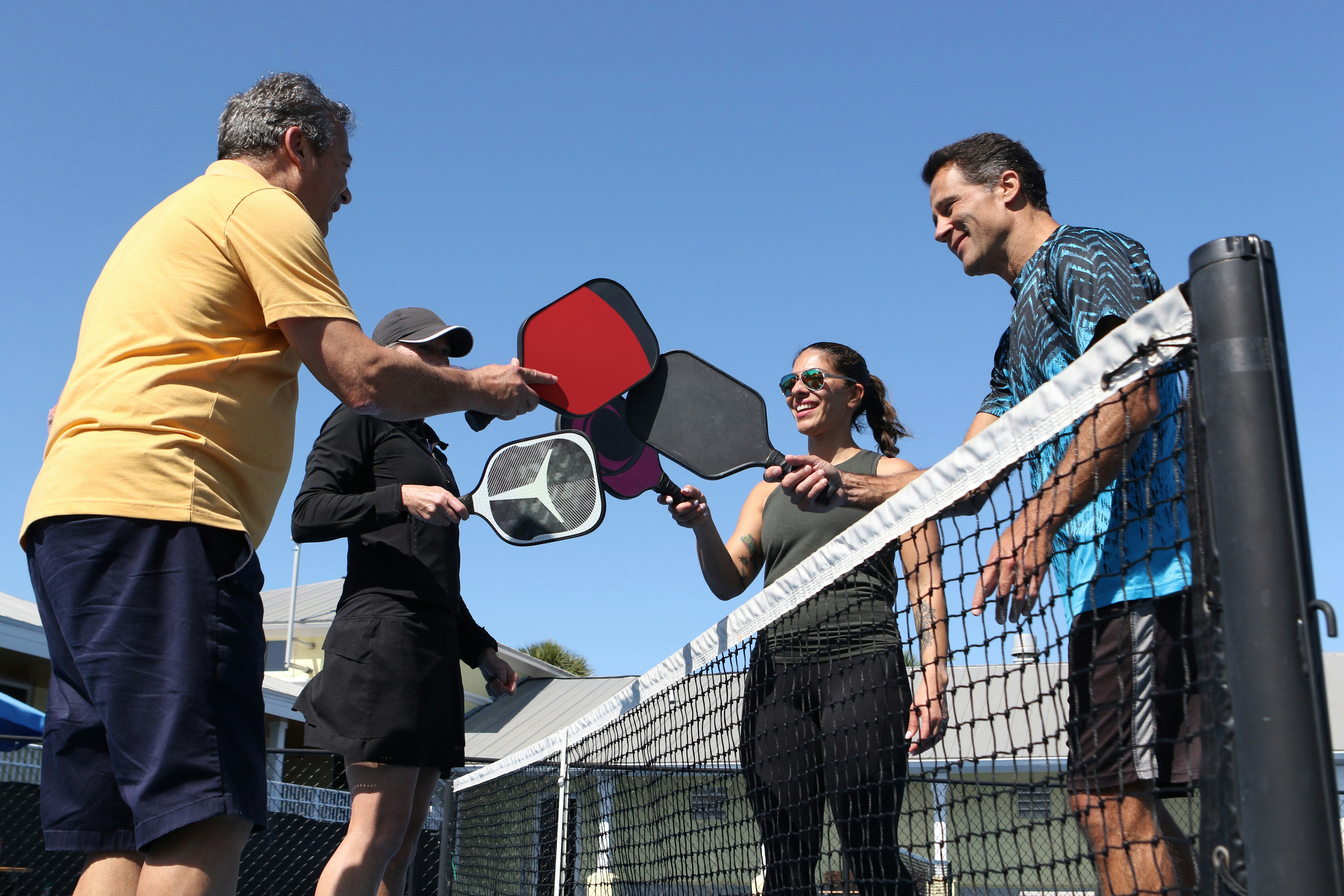 Lindon neighbors playing pickleball together